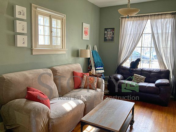 Living room with vaulted ceilings