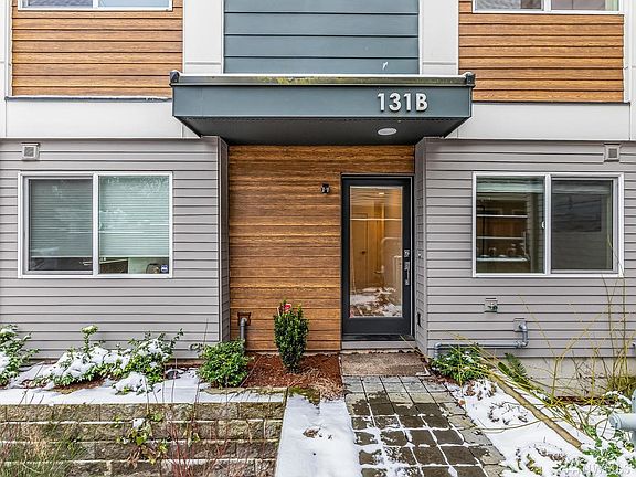 A welcoming front entry is surrounded by drought resistant landscaping. 