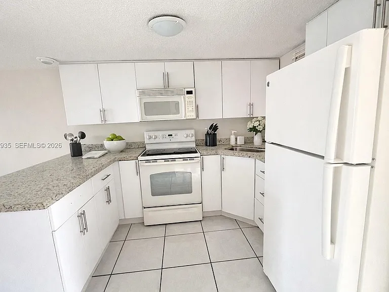 5575 W 26th Ct #203 — Photo 5