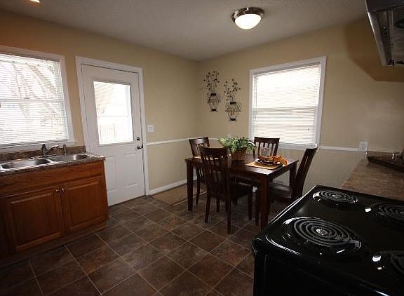 Bright and spacious kitchen with brand new flooring and updated appliances. Also, new hardware.
