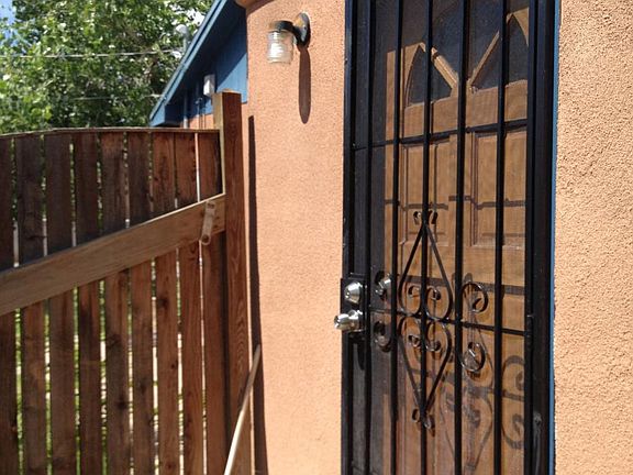 Front door with security screen door.