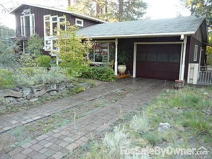 Garage with paver driveway