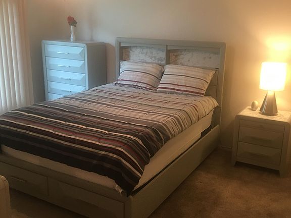 Master modern BR suite, w/Queen size top mattress, and matching dresser, chest, night stand plus a large walk-in closet.