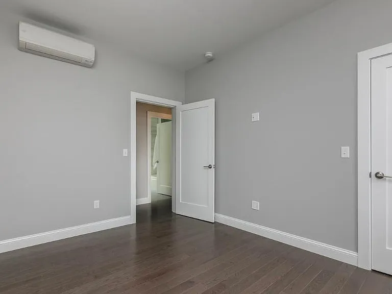 Bedroom #2. Fits a queen sized bed and dresser. Has custom California Closet design in closet.
