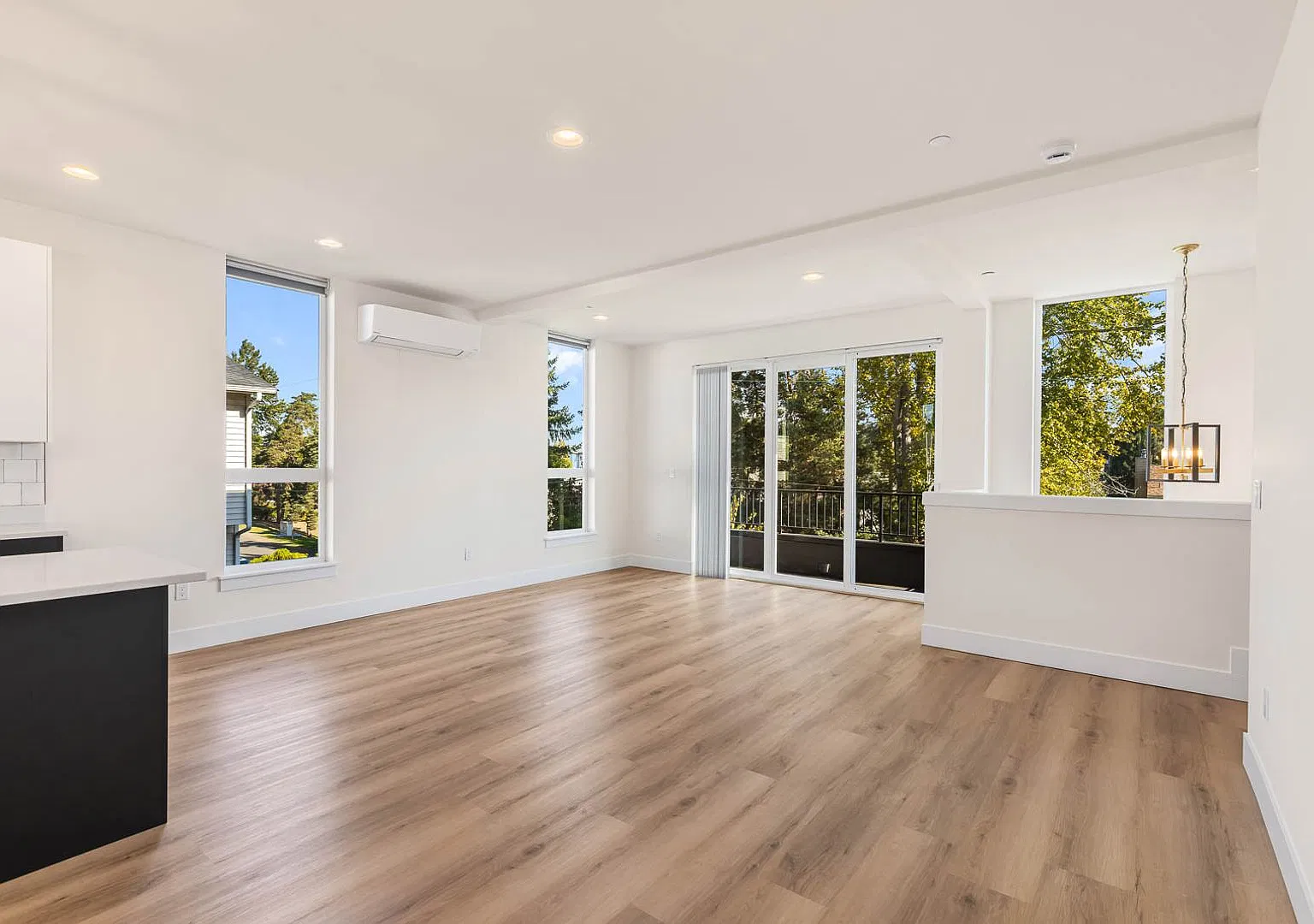 Modern Corner Home with Abundant Natural Light, Spacious Balcony & 2-Car Garage! — Photo 4