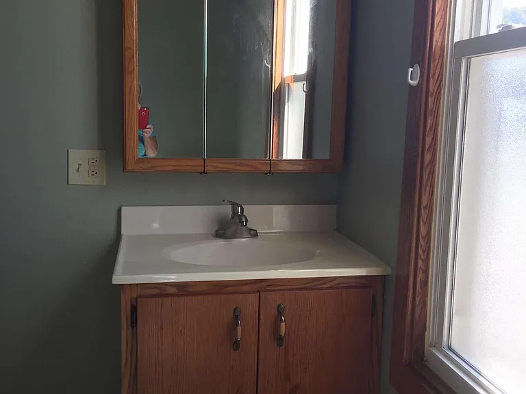 Bathroom 10x10, shower/tub combo opposite window