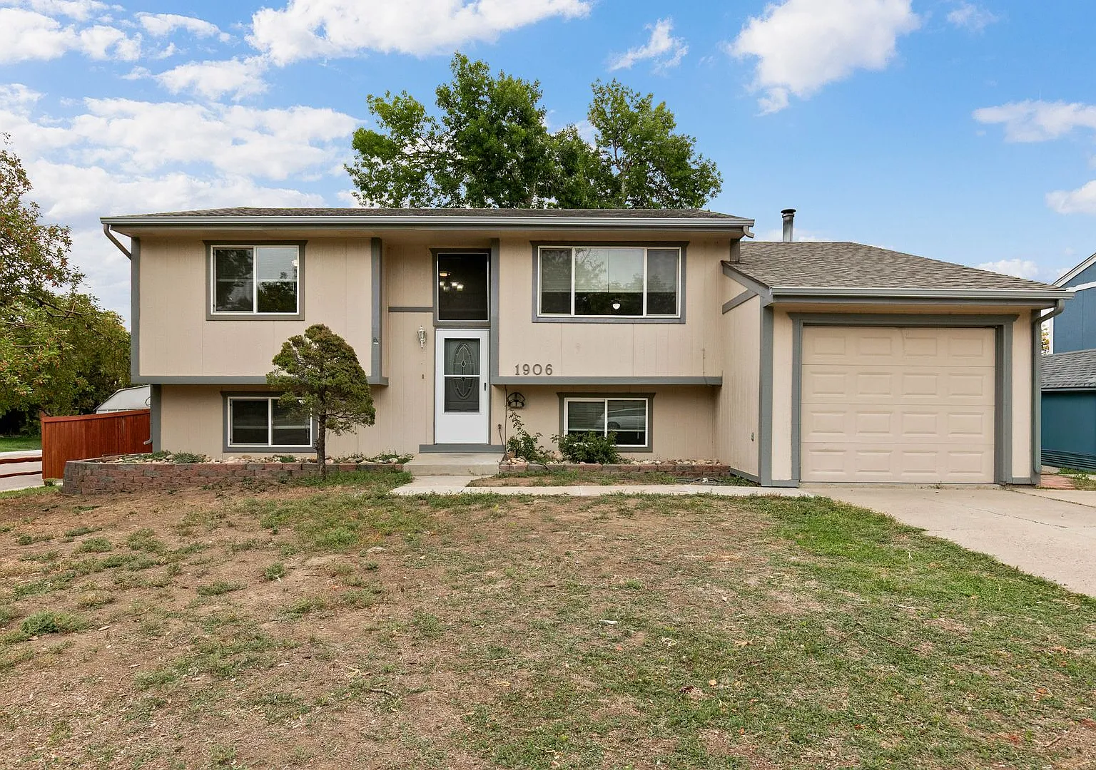 Spacious Loveland Home with Fenced Yard, & Fireplace — Photo 1