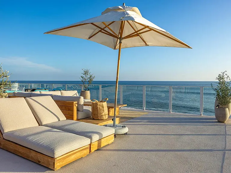 Unwind on the expansive deck, where panoramic ocean views redefine coastal living.