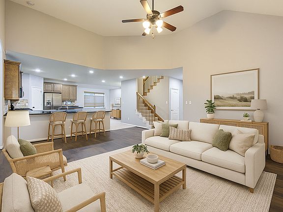 Experience effortless flow in this open-concept living and kitchen space _ perfect for entertaining, connecting, and everyday comfort. The seamless layout brings everyone together, whether you're cooking, relaxing, or hosting. (Virtually Staged)