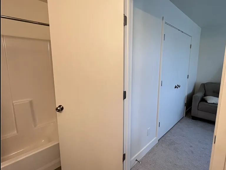 Door from second bedroom to attached bathroom