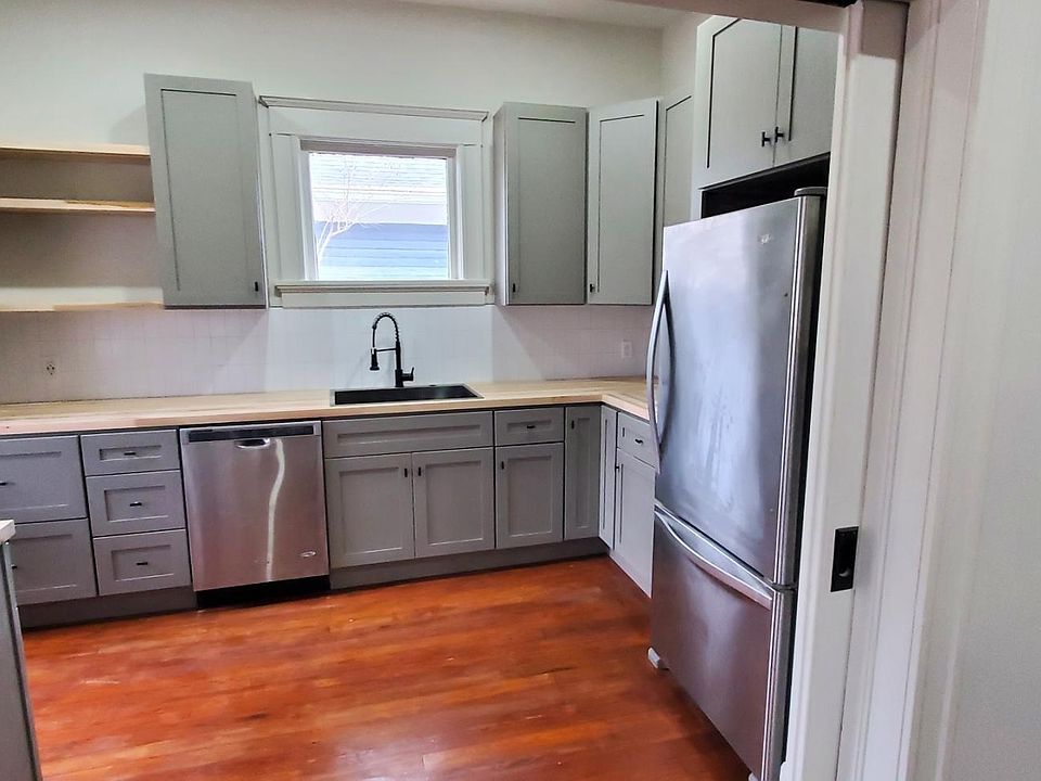 New Kitchen with Pocket Doors Separating Living Room