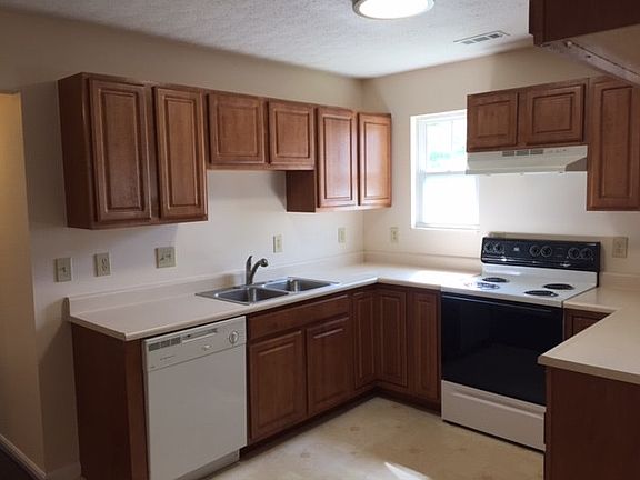 Kitchen with New Stove, New Fridge and Dishwaqsher