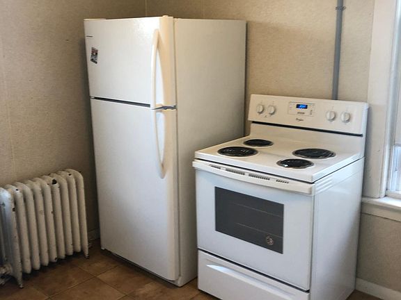 Kitchen area with newer appliances.