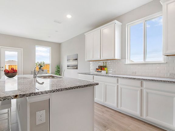 Abundant cabinet space in kitchen