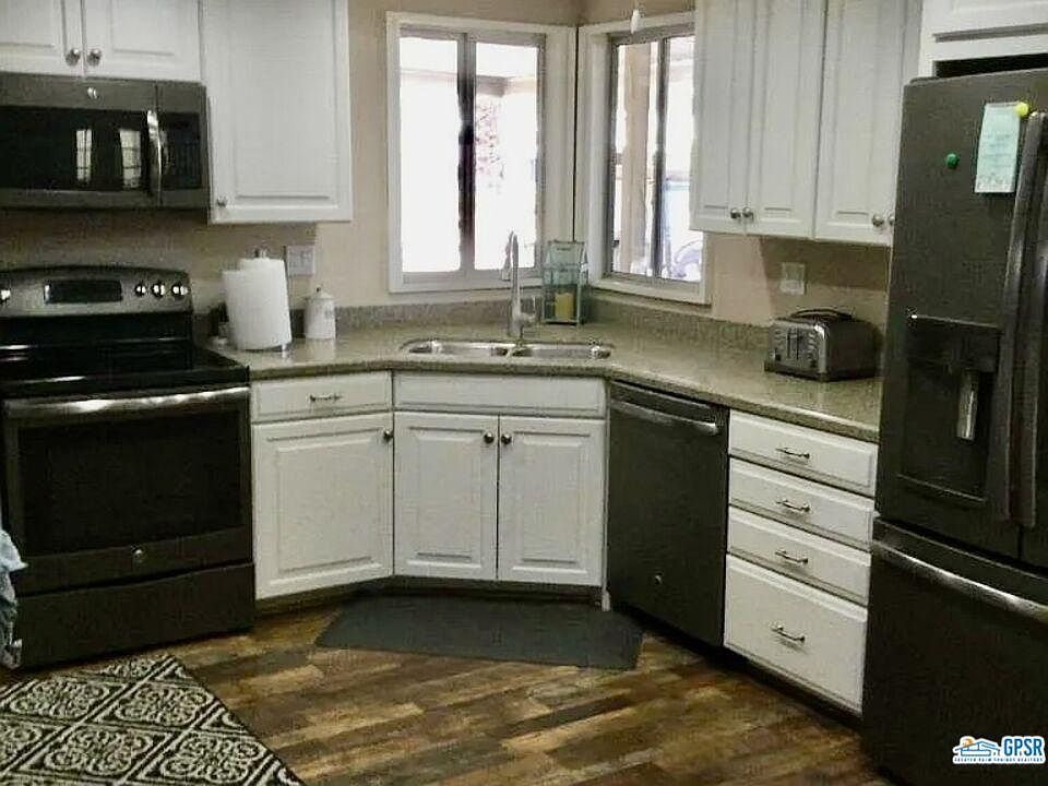 Large Newer Kitchen with Stainless Steel Appliances
