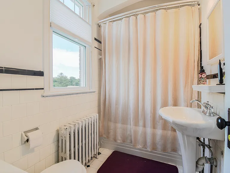 2nd floor bathroom with shower and tub