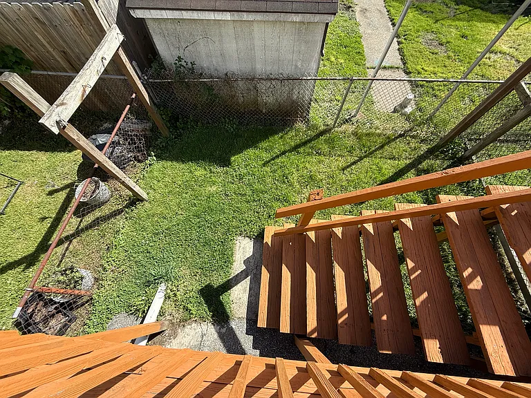 Small fenced back yard. Low maintenance.