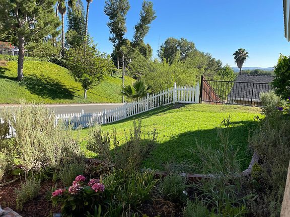 Quaint charm enclosed with a picket fence