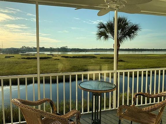 Enjoy coffee off mid-level patio, adjacent to the family room/great room