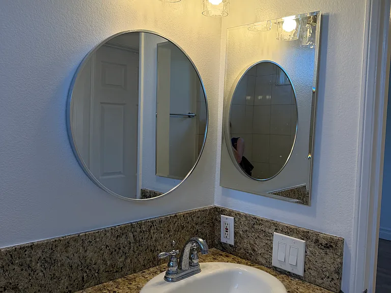 SECOND BATHROOM HAS NEW LIGHTING, NEW MEDICINE CABINET.