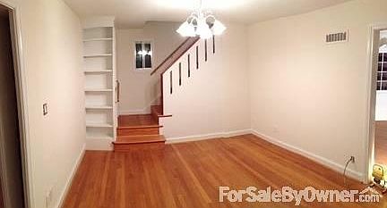 Entry Family Room
						:
						Built-In bookcase/ arts and Craft carpentry on stairs