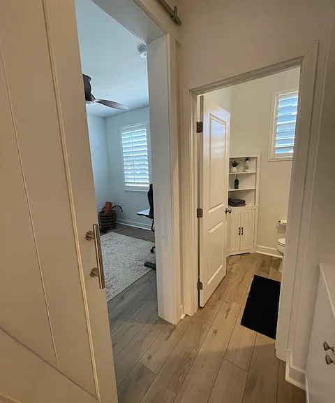First bedroom has upgraded barn door.