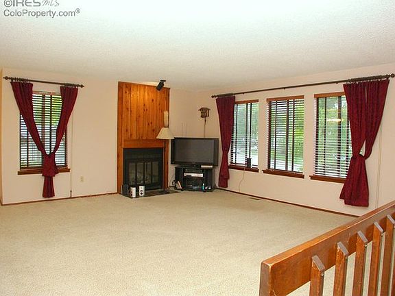Living room with wood burning fireplace