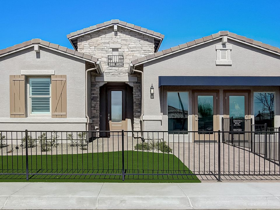 Elegant stone facade, dual entrance design, and pristine landscaping define this stunning Mirada Cro