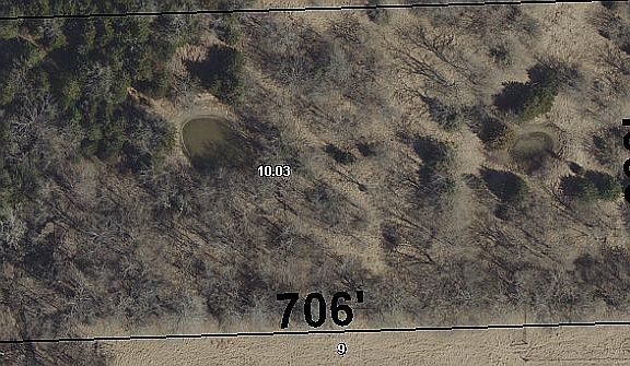 5 acres w/300 ft road front