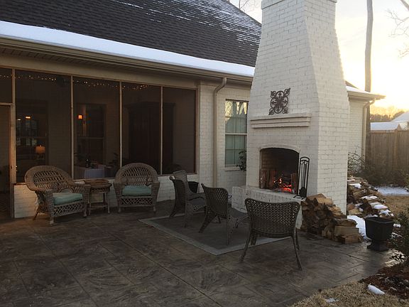 screened porch and fireplace