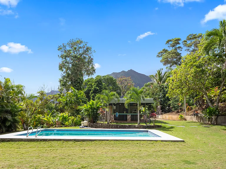 Enjoy the shared pool, accessible to both the upstairs and downstairs residents.