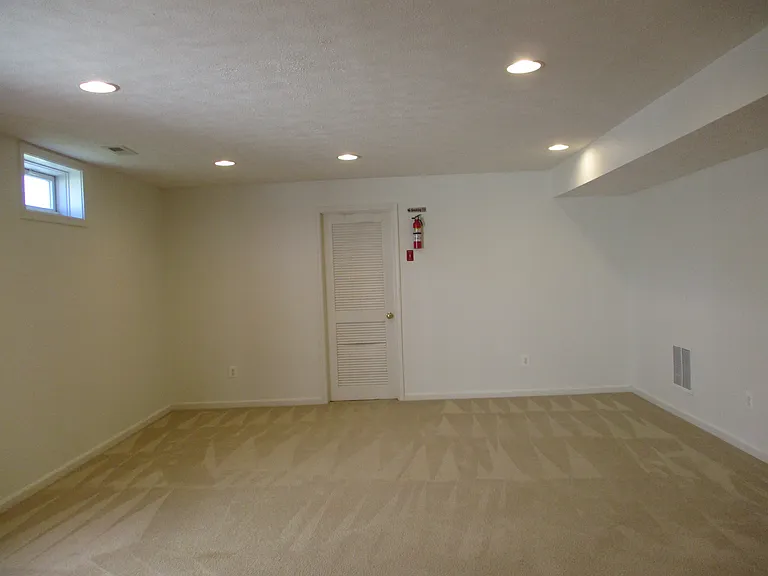 Finished Lower Level looking Towards Entrance to Unfinished Portion of Lower Level
