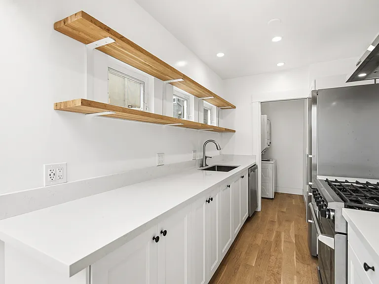 View of the kitchen and the laundry room entrance