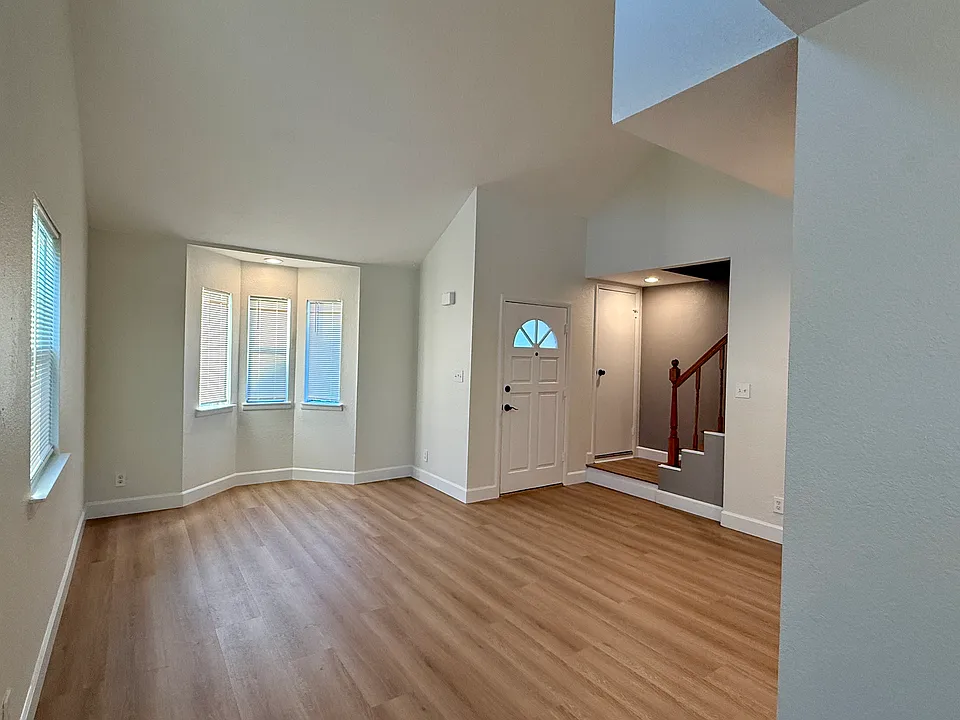 Large living room with lots of natural light