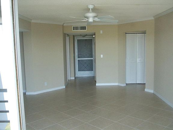 Living room freshly painted and tiled floor.