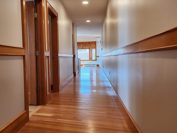 Hallway into apartment, two bedrooms to the left.