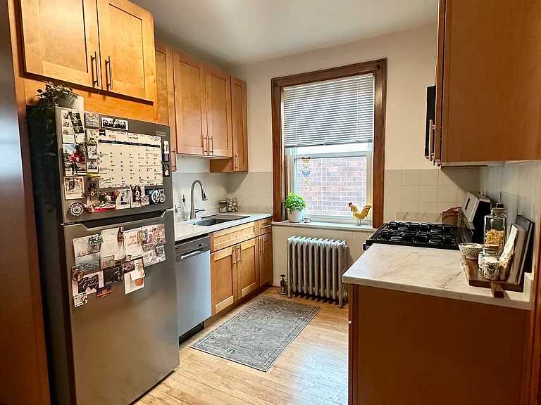 brand new kitchen w/ stainless steel appliances and custom cabinets