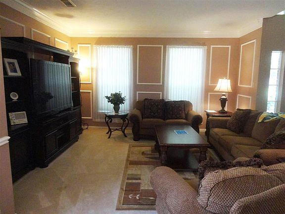 Great formal living area receiving your guests