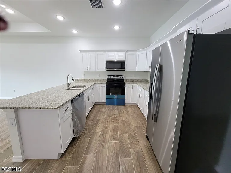 684 Thomas Sherwin Ave S — Photo 4