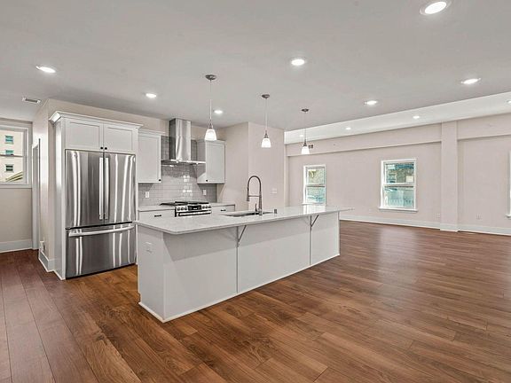 Kitchen Open to Living and Dining Room