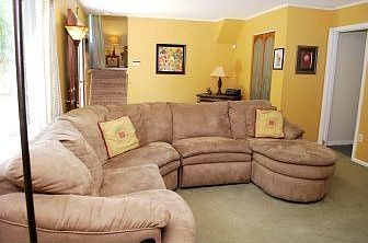 Family room with wall-to-wall carpeting