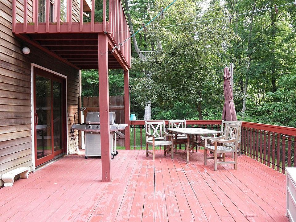 Deck spans the whole width of the back of home.