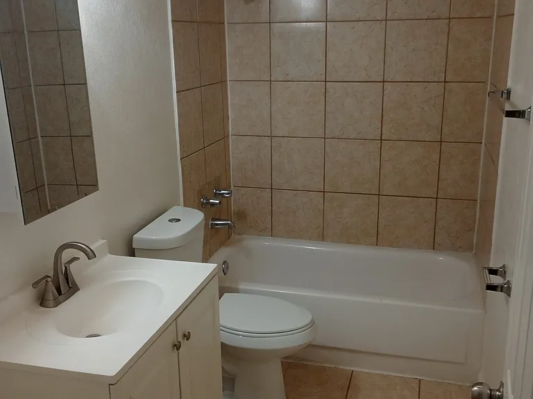 remodeled bathroom with tile surround