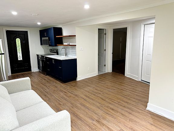 Living Space & Doors to Bathroom & Bedroom