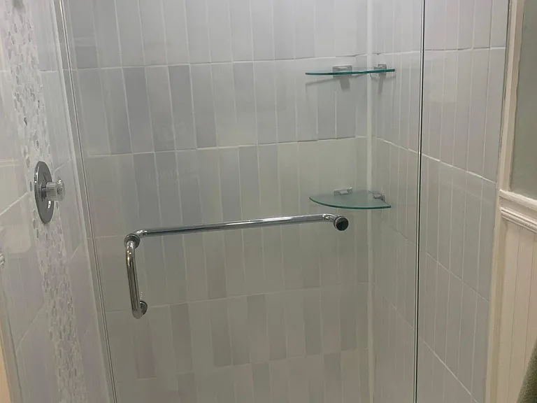 New tiled shower with glass door