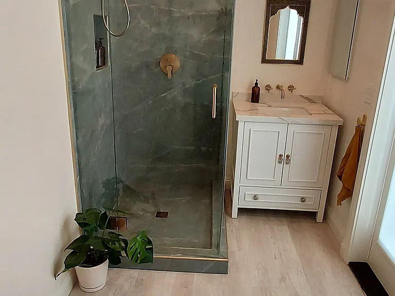 Duel shower head with rainfall option