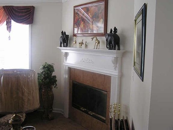 Tile Floors Throughout and around Gas Fireplace