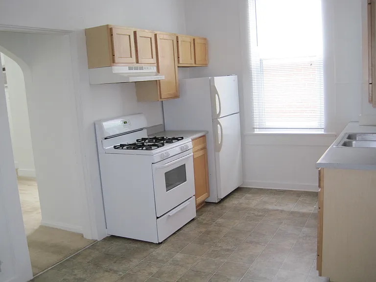Kitchen with gas stove, maple cabinets