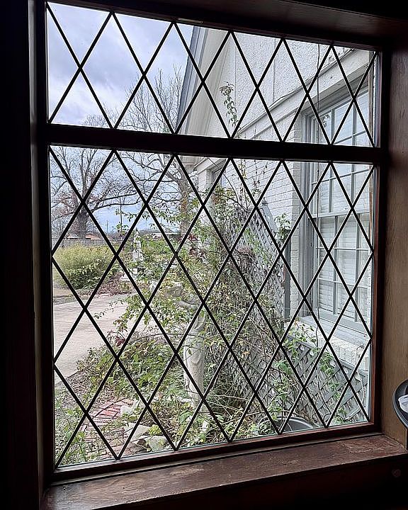 Entryway triple pane window