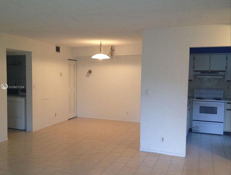 1st image of 614 Gardens Dr APT 104